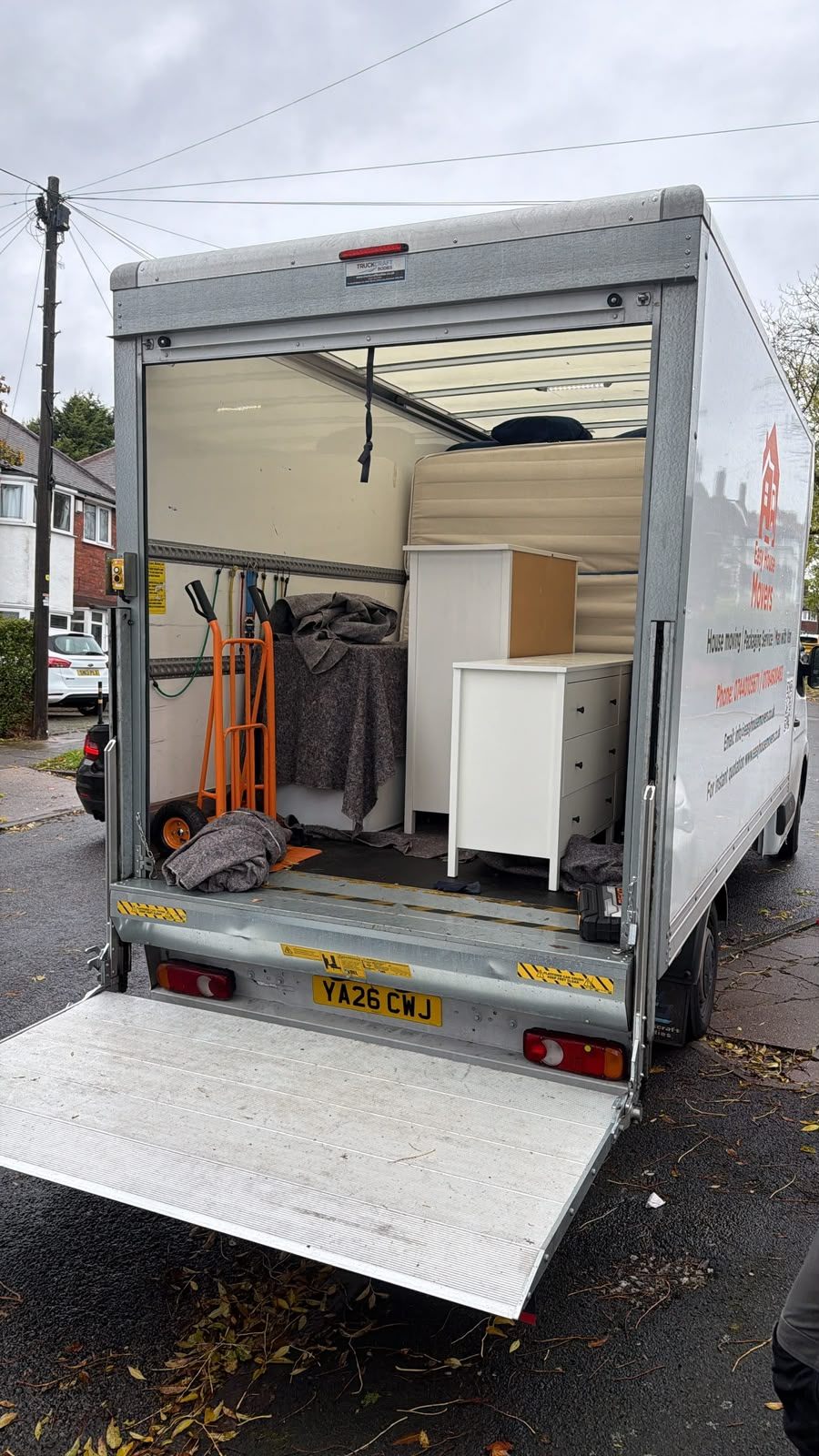 Easy House Movers Luton van with tail lift, loaded on a house move
