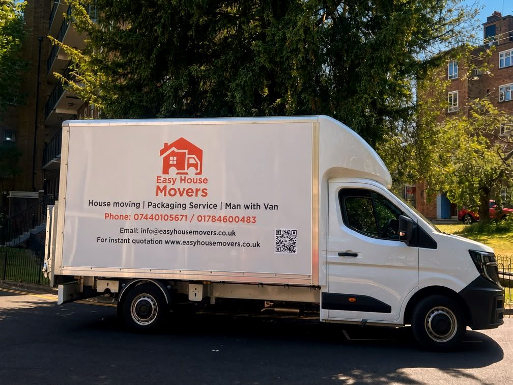 Easy House Movers Luton removal van with company livery, parked on a residential street